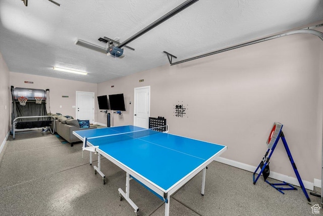 3334 W 2700 S, Hurricane, UT 84737 - rec room with a textured ceiling and a garage