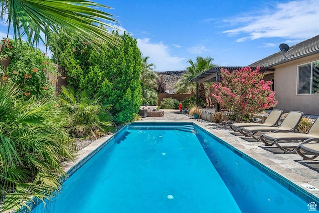 3334 W 2700 S, Hurricane, UT 84737 - swimming pool with a patio area, a fenced backyard, and a pergola