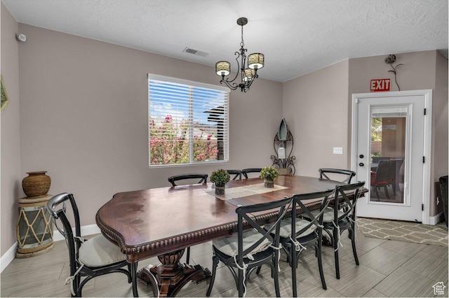 3334 W 2700 S, Hurricane, UT 84737 - dining area with a chandelier and baseboards