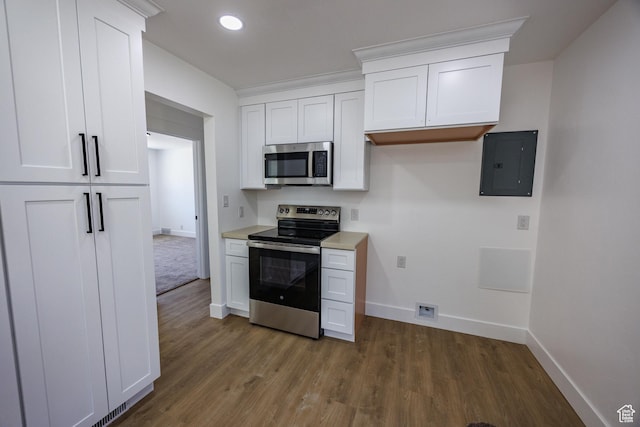 875 N 50 W, Orem, UT 84057 - kitchen with stainless steel appliances, electric panel, wood finished floors, white cabinetry, and recessed lighting