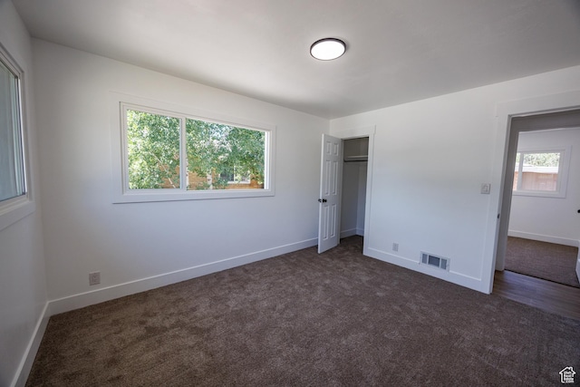 875 N 50 W, Orem, UT 84057 - unfurnished bedroom featuring dark colored carpet and a closet
