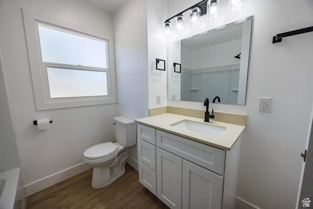 875 N 50 W, Orem, UT 84057 - bathroom featuring wood finished floors, vanity, and a tub