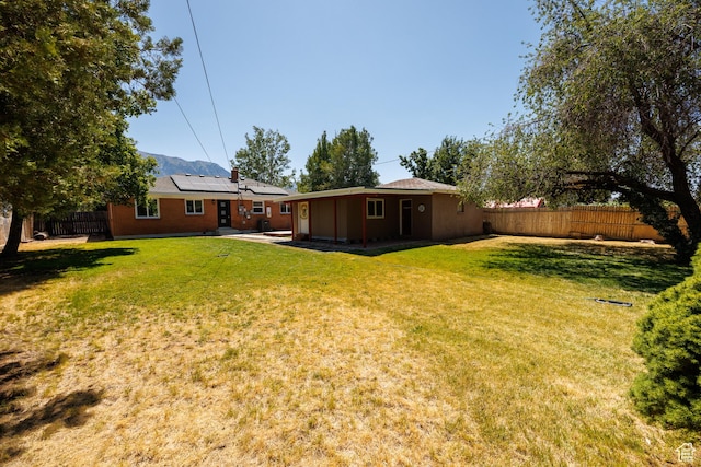 875 N 50 W, Orem, UT 84057 - fenced backyard featuring a patio area