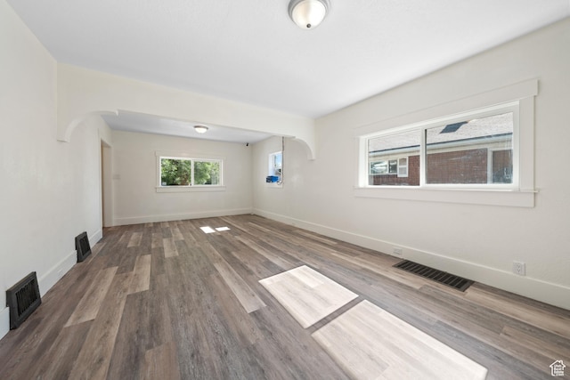 726 E 29th S, Ogden, UT 84403 - spare room featuring wood finished floors and arched walkways