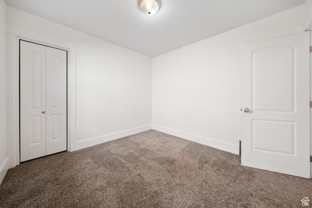 726 E 29th S, Ogden, UT 84403 - unfurnished bedroom with carpet and a closet