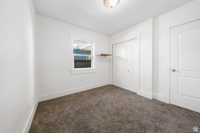 726 E 29th S, Ogden, UT 84403 - unfurnished bedroom with carpet and a closet