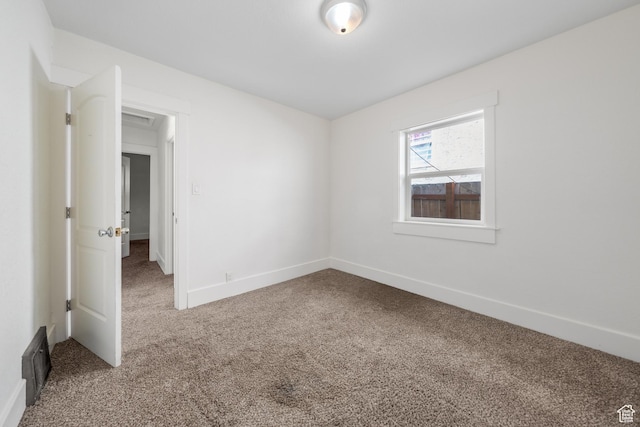 726 E 29th S, Ogden, UT 84403 - unfurnished room with carpet and baseboards