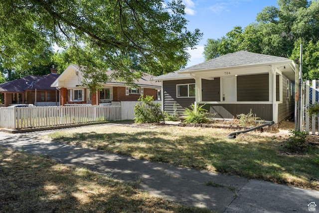726 E 29th S, Ogden, UT 84403 - view of front facade with a fenced front yard and a porch