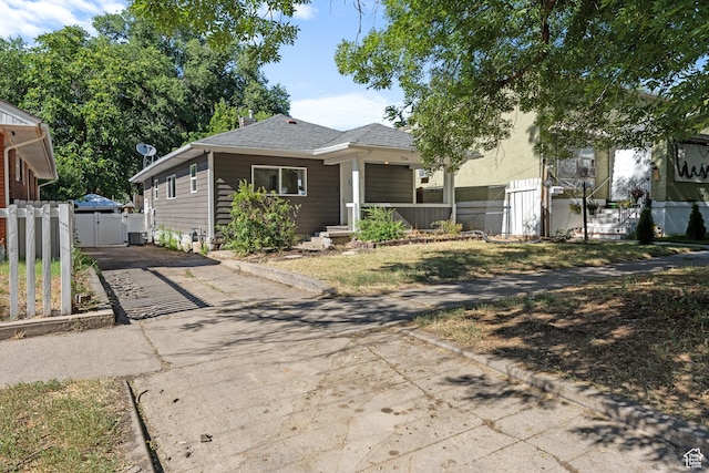 726 E 29th S, Ogden, UT 84403 - bungalow-style house featuring driveway, a porch, and a gate
