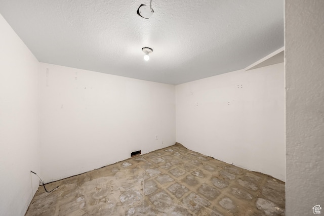 726 E 29th S, Ogden, UT 84403 - empty room featuring a textured ceiling