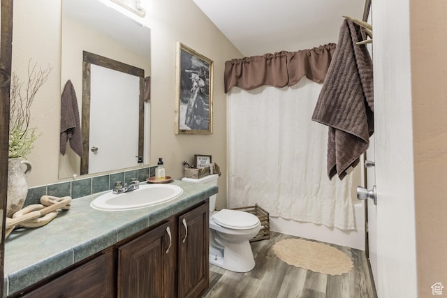 5375 N Canal Rd, Lapoint, UT 84039 - bathroom featuring vanity, wood finished floors, and shower / bath combo