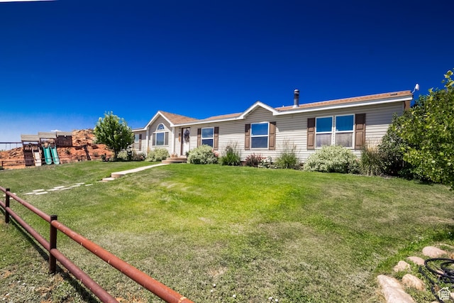 5375 N Canal Rd, Lapoint, UT 84039 - view of front of home featuring a playground