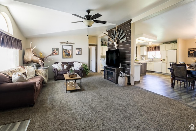 5375 N Canal Rd, Lapoint, UT 84039 - carpeted living area featuring plenty of natural light, ceiling fan, vaulted ceiling, and wood finished floors