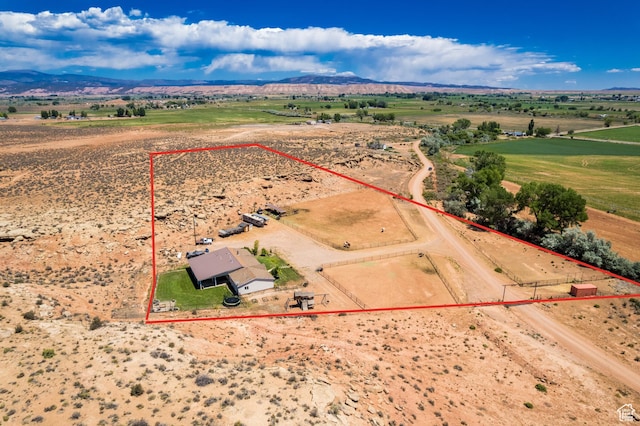 5375 N Canal Rd, Lapoint, UT 84039 - aerial view of sparsely populated area featuring a mountain backdrop and property parcel outlined