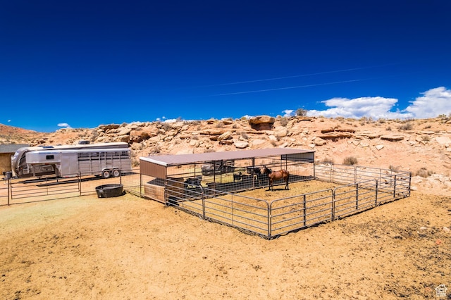 5375 N Canal Rd, Lapoint, UT 84039 - view of yard featuring an exterior structure, an outbuilding, and a view of countryside