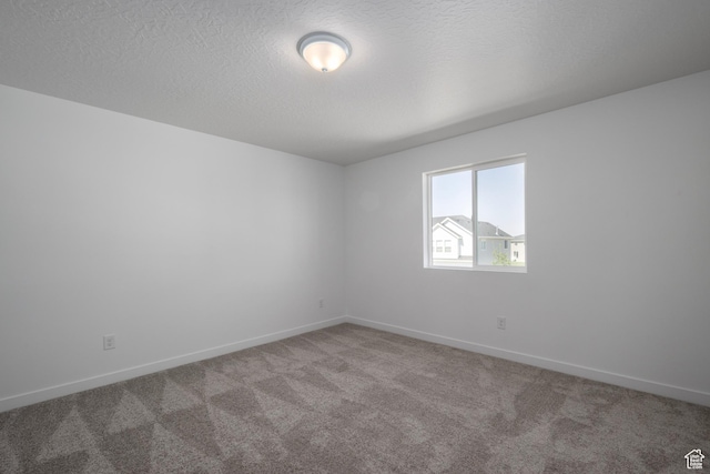 1844 E Bison Dr N Unit B229, Eagle Mountain, UT 84005 - unfurnished room featuring carpet flooring and a textured ceiling