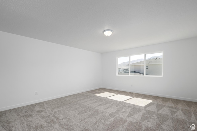 1844 E Bison Dr N Unit B229, Eagle Mountain, UT 84005 - carpeted spare room featuring baseboards