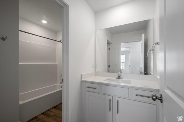 1844 E Bison Dr N Unit B229, Eagle Mountain, UT 84005 - full bath with vanity, shower / bath combination, and wood finished floors