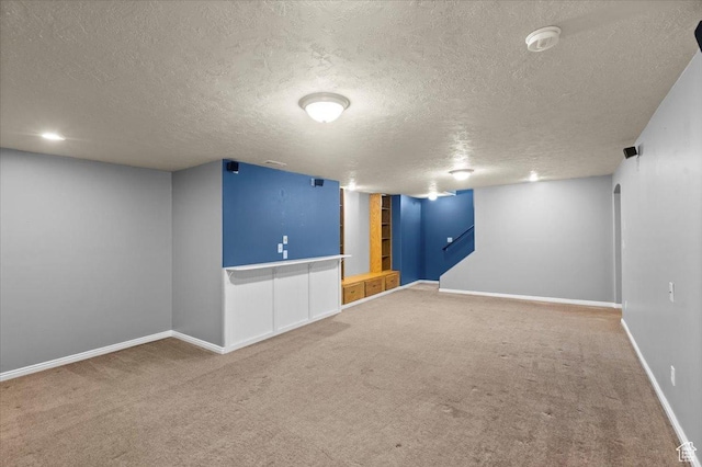845 S 1150 E, Preston, ID 83263 - finished basement with carpet, a textured ceiling, and built in shelves