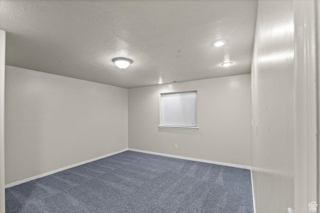 845 S 1150 E, Preston, ID 83263 - spare room featuring dark carpet, a textured ceiling, and recessed lighting