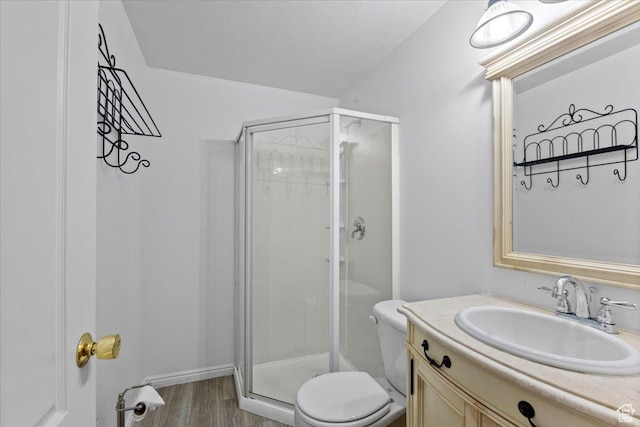 845 S 1150 E, Preston, ID 83263 - full bathroom featuring a stall shower, vanity, and wood finished floors
