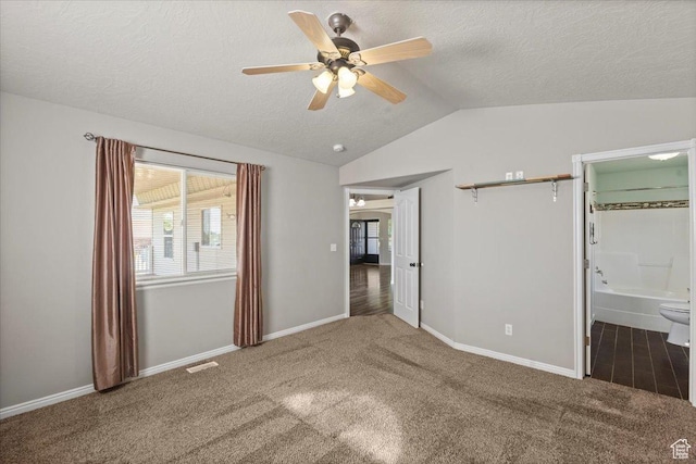845 S 1150 E, Preston, ID 83263 - unfurnished bedroom with carpet, lofted ceiling, a textured ceiling, and ceiling fan
