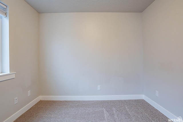 124 N Peach St, Santaquin, UT 84655 - empty room with carpet floors