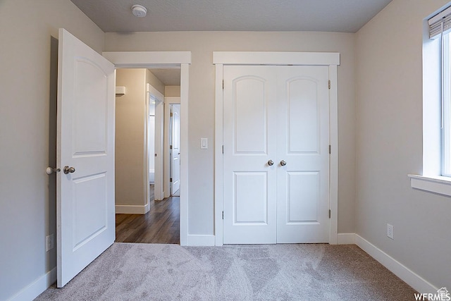 124 N Peach St, Santaquin, UT 84655 - unfurnished bedroom with carpet and a closet