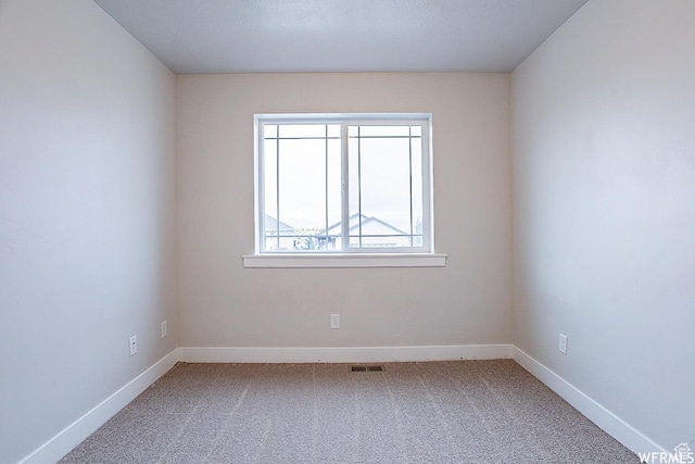 124 N Peach St, Santaquin, UT 84655 - carpeted empty room featuring baseboards