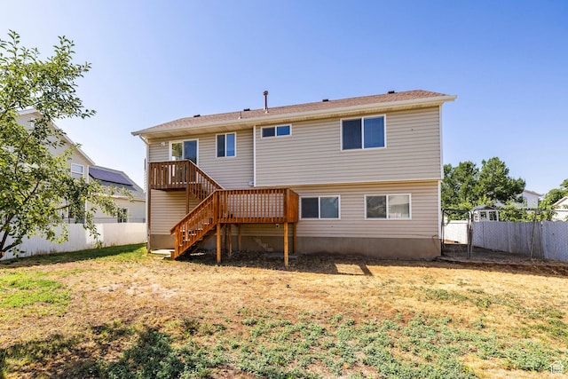 902 W 4200 S, Riverdale, UT 84405 - back of property featuring a fenced backyard and stairway