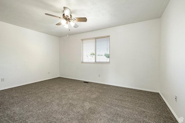 902 W 4200 S, Riverdale, UT 84405 - spare room with dark colored carpet and a ceiling fan