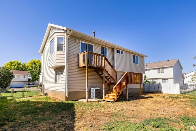 902 W 4200 S, Riverdale, UT 84405 - rear view of property featuring a fenced backyard and stairway