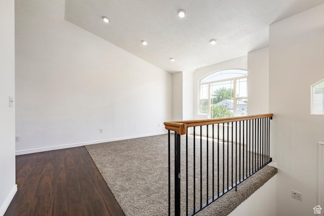 902 W 4200 S, Riverdale, UT 84405 - corridor featuring wood finished floors, vaulted ceiling, and recessed lighting