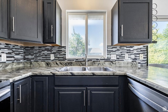902 W 4200 S, Riverdale, UT 84405 - kitchen featuring dishwasher, decorative backsplash, plenty of natural light, and stove