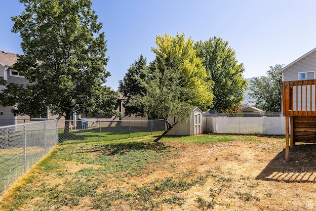 902 W 4200 S, Riverdale, UT 84405 - fenced backyard with a storage unit