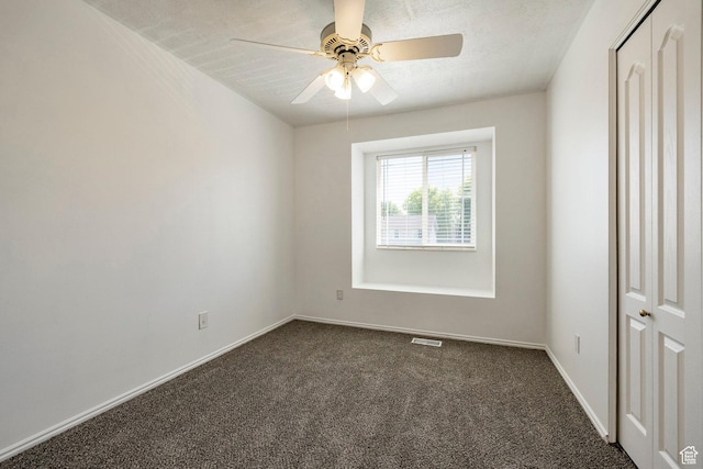 902 W 4200 S, Riverdale, UT 84405 - unfurnished room with dark colored carpet and ceiling fan