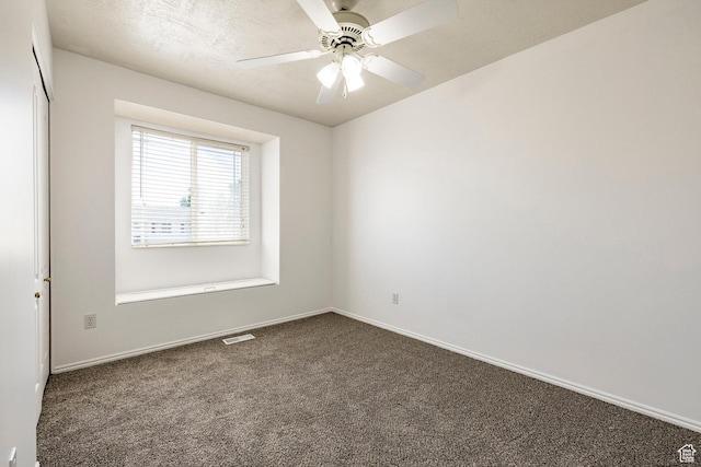 902 W 4200 S, Riverdale, UT 84405 - unfurnished room with dark colored carpet and a ceiling fan