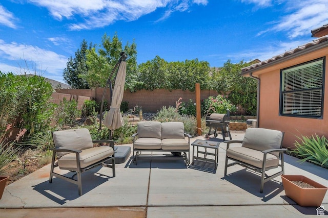 2751 S 3970 W, Hurricane, UT 84737 - fenced backyard featuring an outdoor living space, a patio area, and a grill