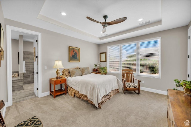 2751 S 3970 W, Hurricane, UT 84737 - bedroom with light colored carpet, a raised ceiling, recessed lighting, connected bathroom, and a ceiling fan