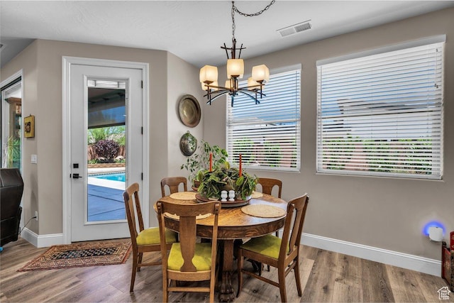 2751 S 3970 W, Hurricane, UT 84737 - dining room featuring wood finished floors and a chandelier