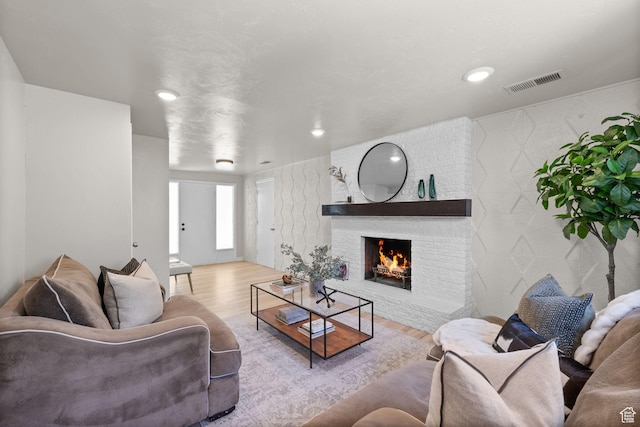 2111 W 5800 S, Roy, UT 84067 - living room with a fireplace, wood finished floors, and recessed lighting