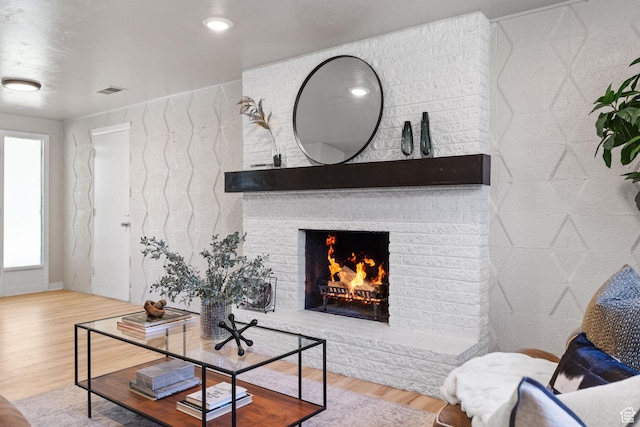 2111 W 5800 S, Roy, UT 84067 - living room featuring wood finished floors and a brick fireplace