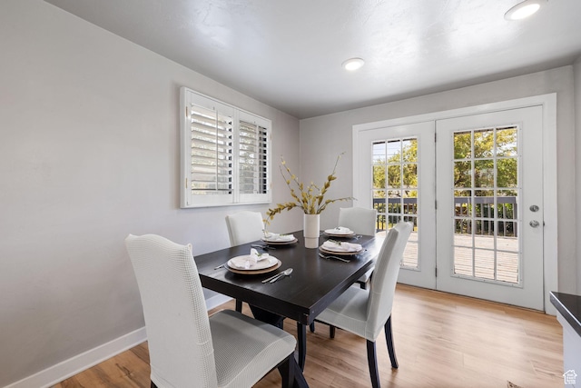 2111 W 5800 S, Roy, UT 84067 - dining area featuring light wood-style flooring and baseboards