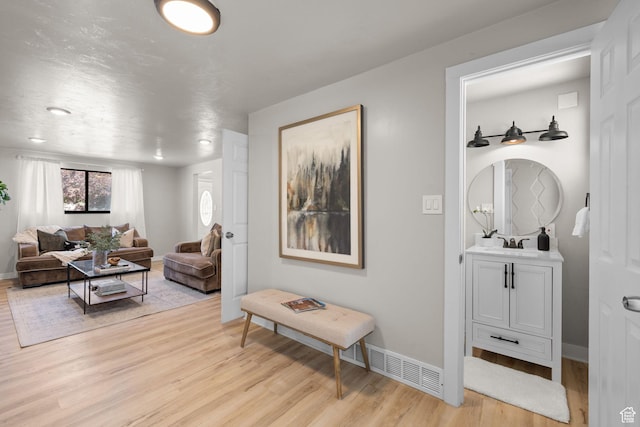 2111 W 5800 S, Roy, UT 84067 - living room featuring light wood-style floors and baseboards