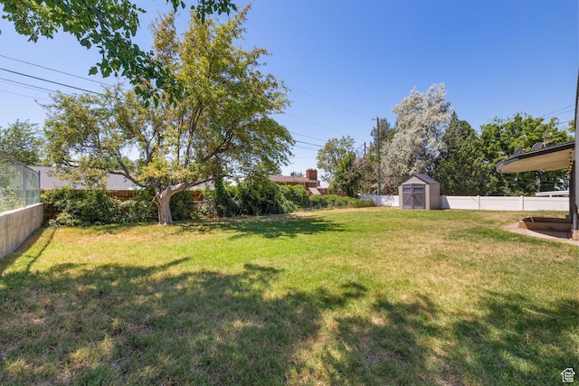 2111 W 5800 S, Roy, UT 84067 - fenced backyard with a storage unit