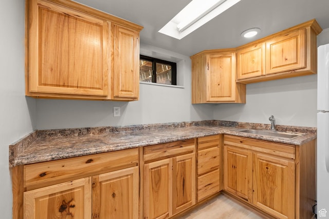 2111 W 5800 S, Roy, UT 84067 - kitchen featuring light brown cabinetry and light wood-style flooring