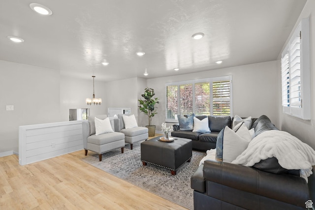 2111 W 5800 S, Roy, UT 84067 - living room featuring a chandelier, recessed lighting, and wood finished floors