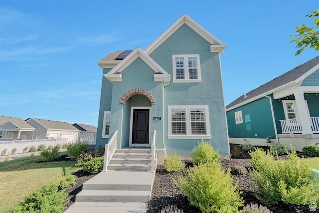6427 W Arranmore Dr, South Jordan, UT 84009 - view of front of property with stucco siding and solar panels