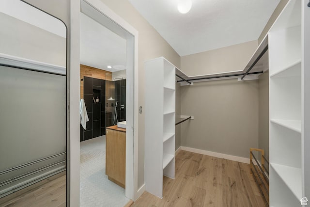 2038 W 8970 S, West Jordan, UT 84088 - walk in closet with light wood-type flooring