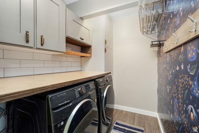 2038 W 8970 S, West Jordan, UT 84088 - washroom with separate washer and dryer, wood finished floors, and cabinet space